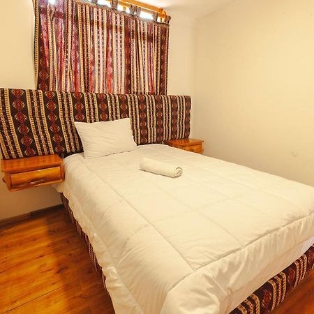 Los Ponchos Inn Apartasuite Otavalo Bagian luar foto