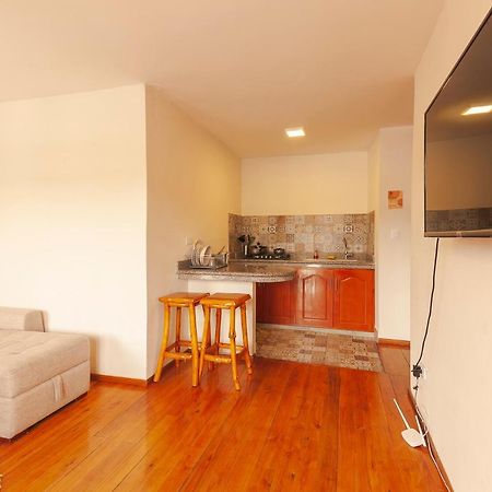 Los Ponchos Inn Apartasuite Otavalo Bagian luar foto