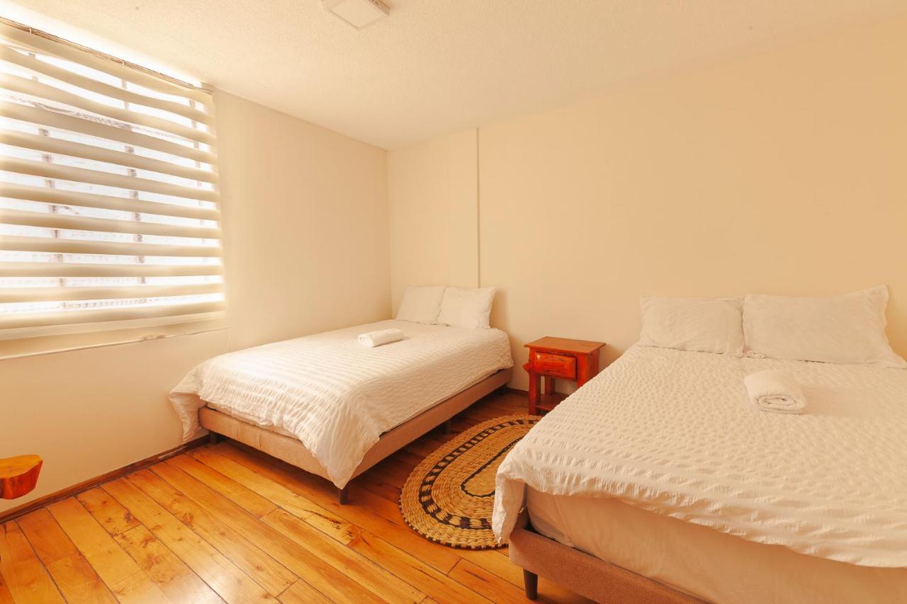 Los Ponchos Inn Apartasuite Otavalo Bagian luar foto