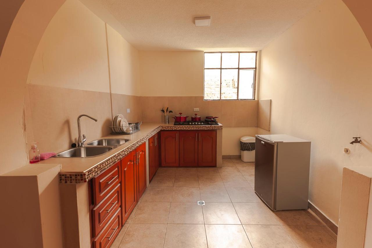 Los Ponchos Inn Apartasuite Otavalo Bagian luar foto