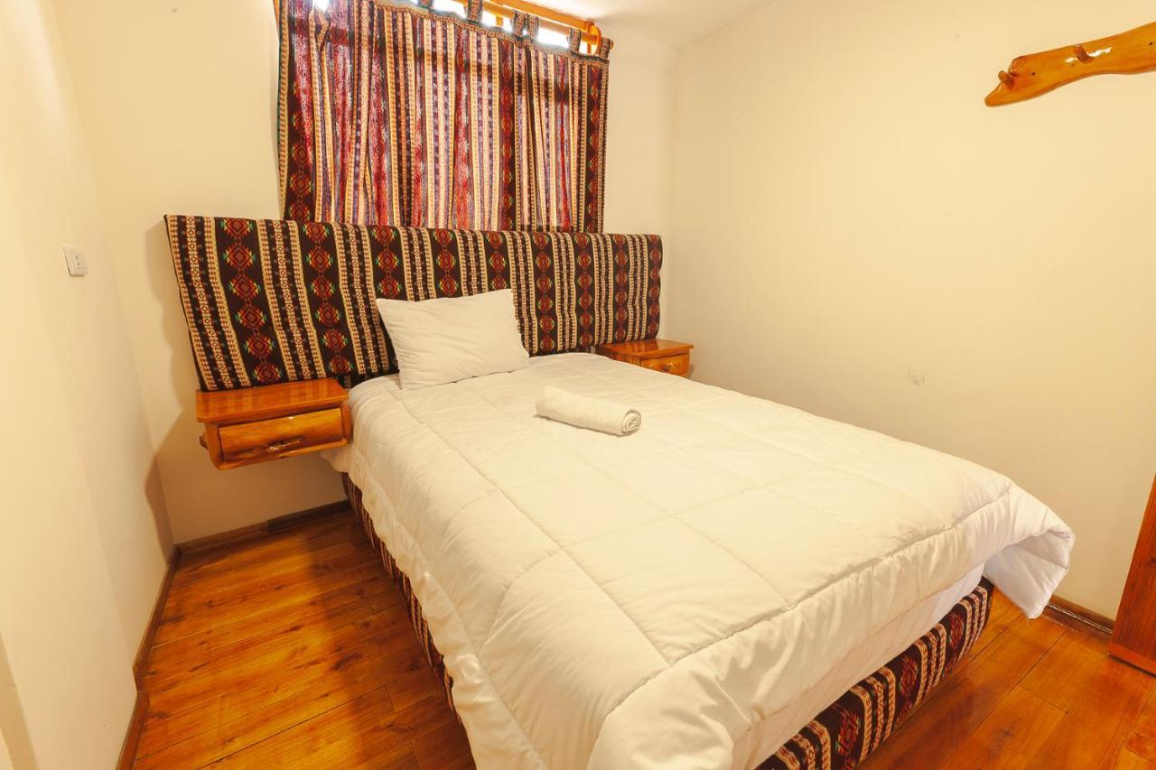 Los Ponchos Inn Apartasuite Otavalo Bagian luar foto