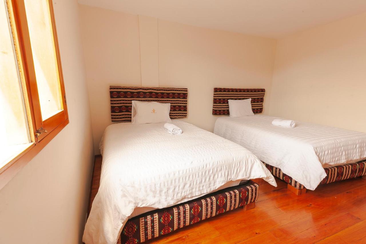 Los Ponchos Inn Apartasuite Otavalo Bagian luar foto