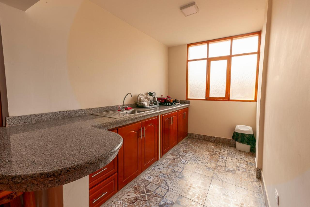Los Ponchos Inn Apartasuite Otavalo Bagian luar foto