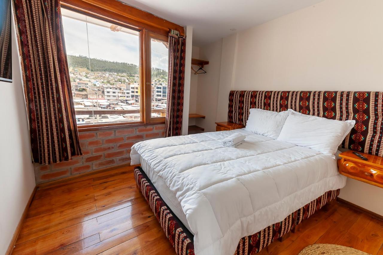 Los Ponchos Inn Apartasuite Otavalo Bagian luar foto