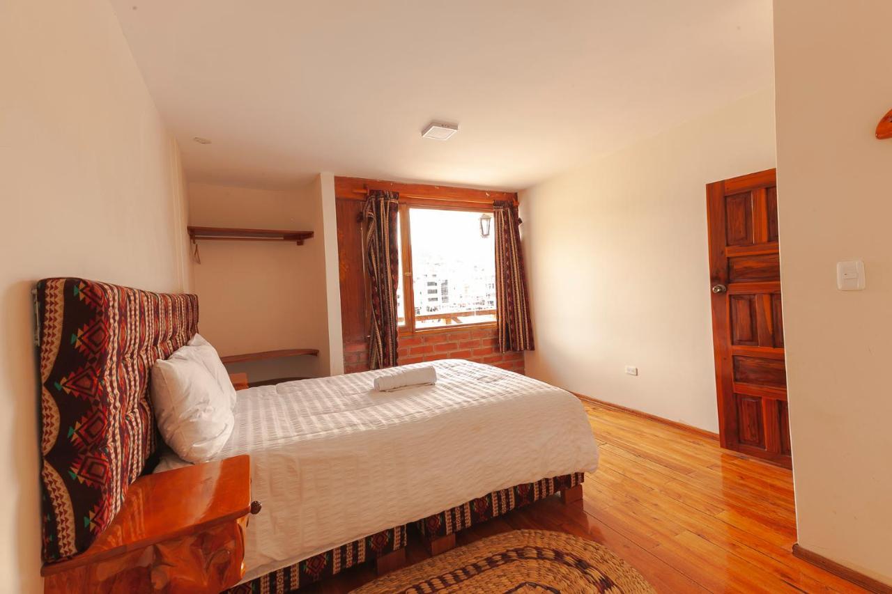 Los Ponchos Inn Apartasuite Otavalo Bagian luar foto